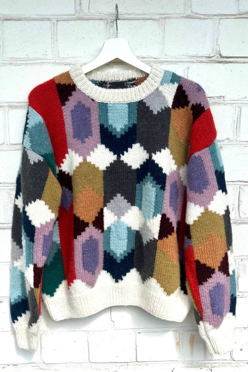 жіночий светр із геометричним візерунком