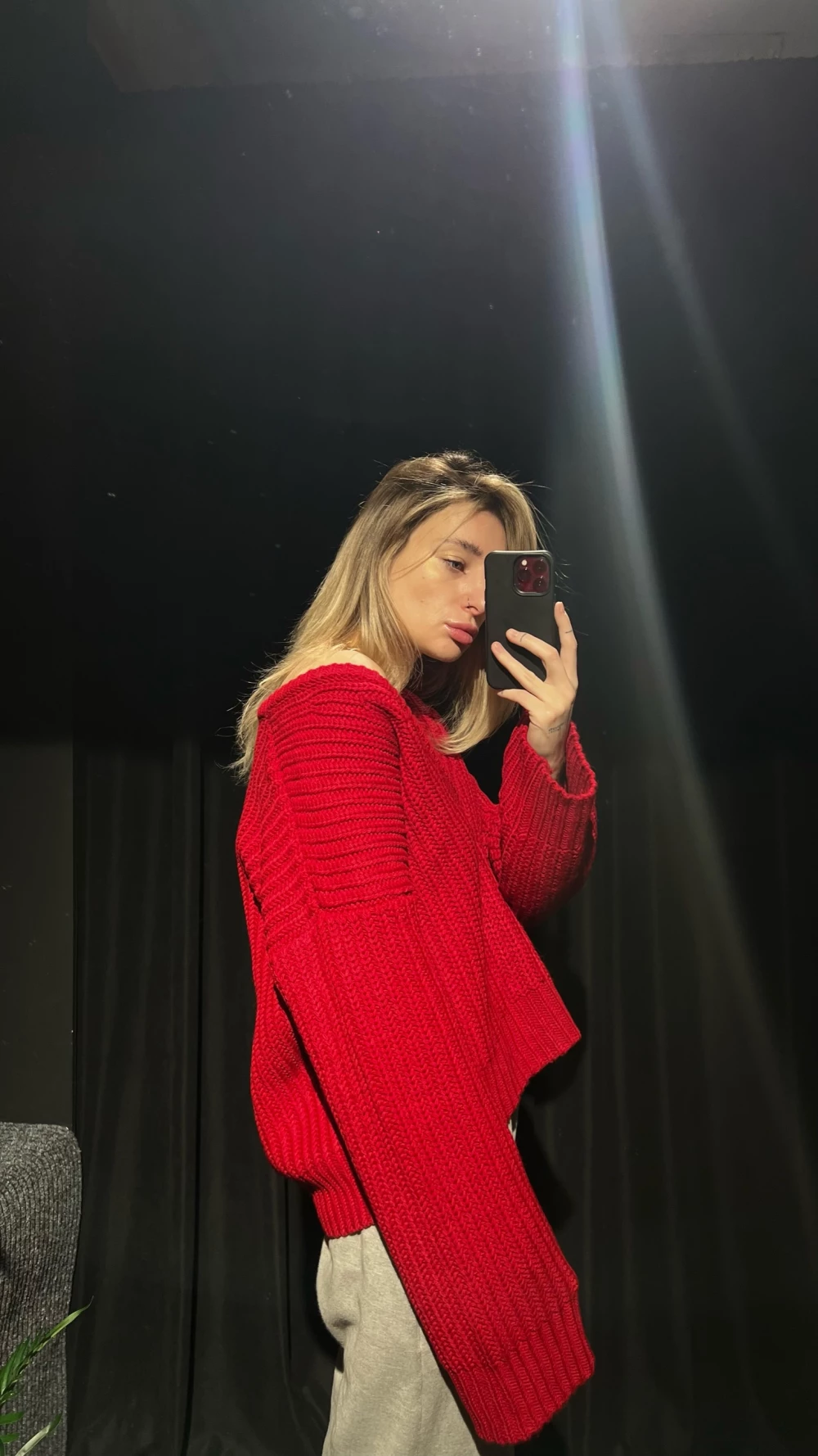 sweater with a deep v-neck sleeve in dark red