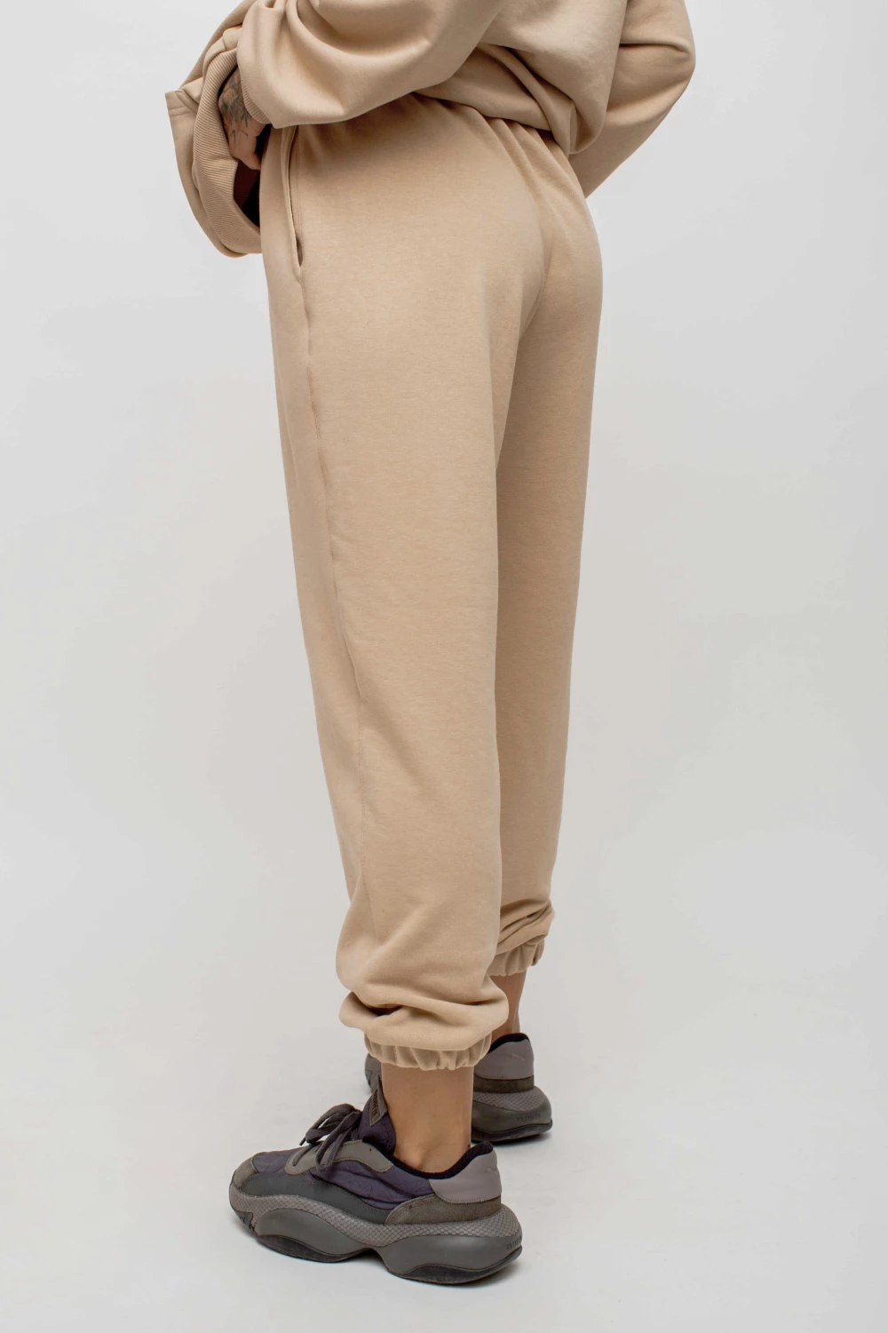 штани unisex uni у бежевому кольорі